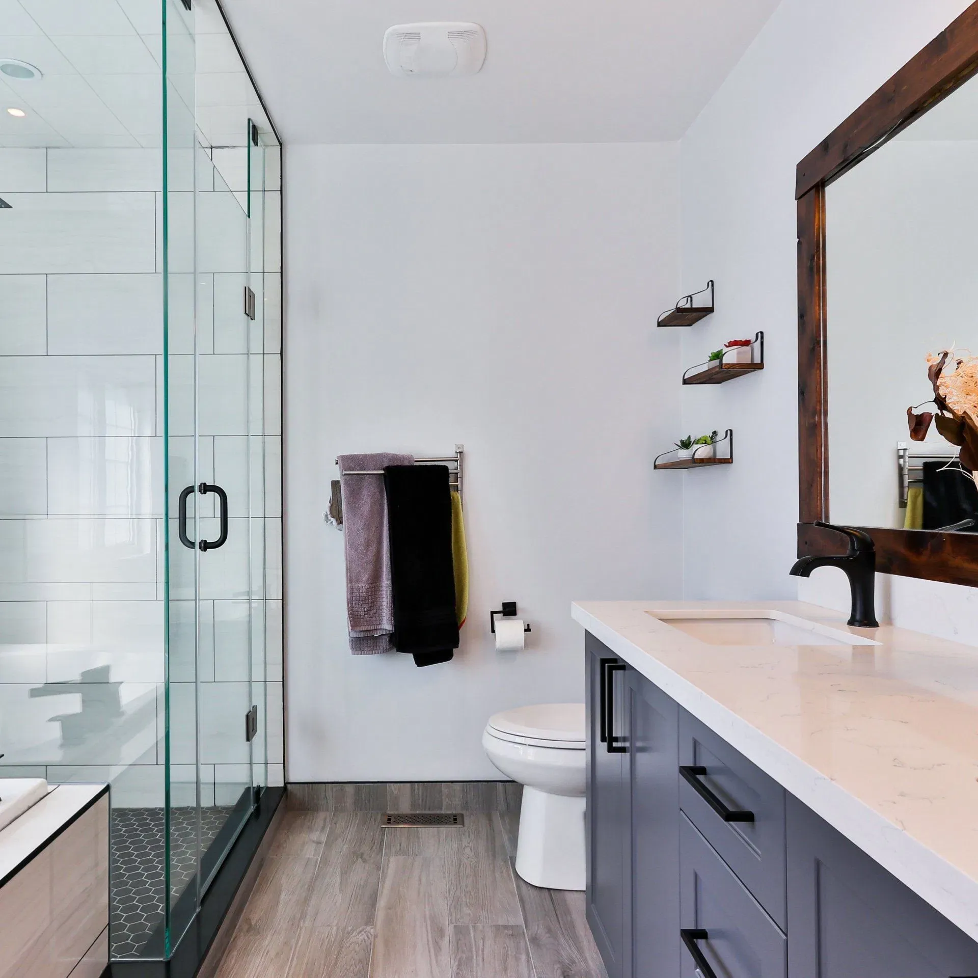 Guest bathroom with charcoal floor tiles