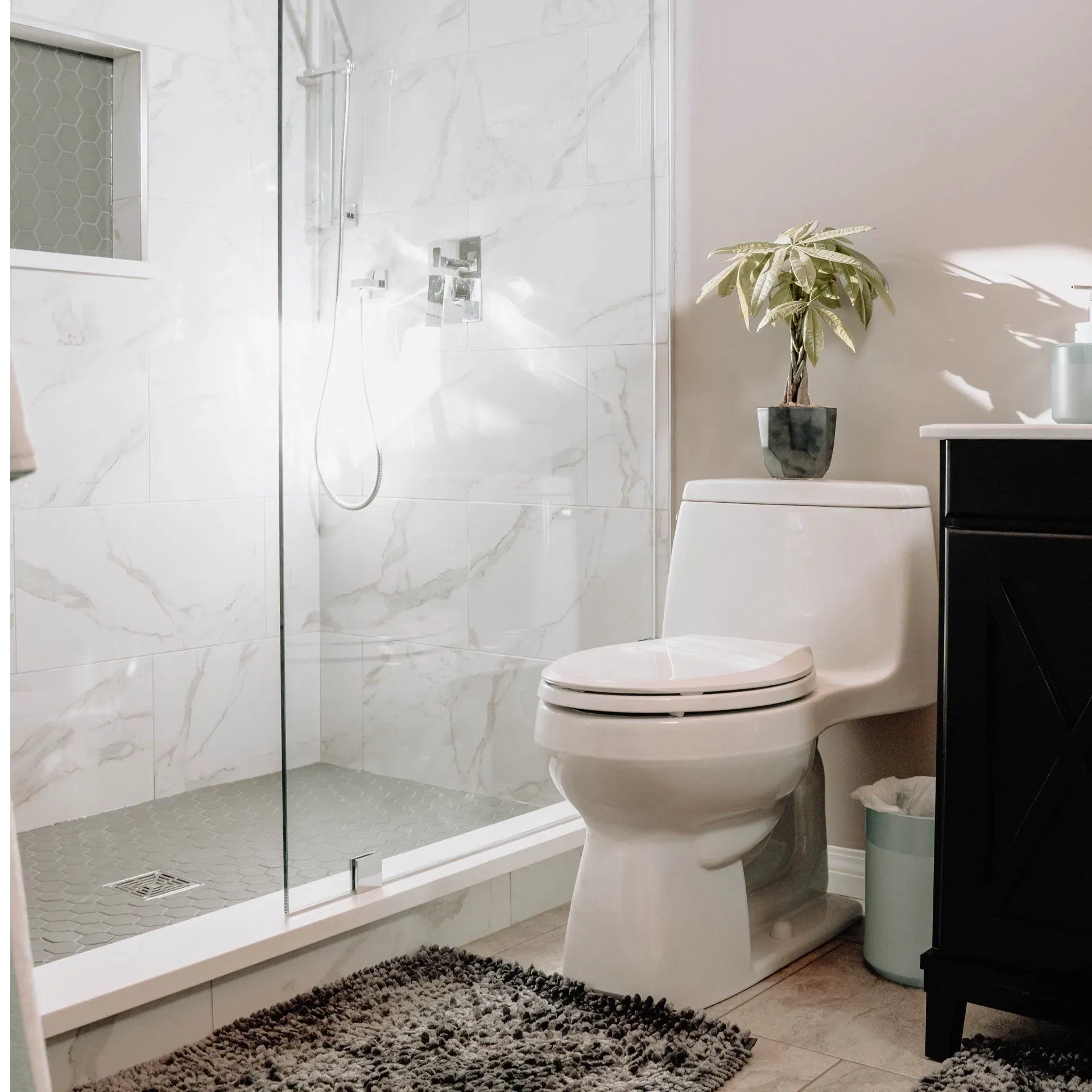 Modern marble bathroom with walk-in shower
